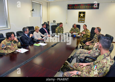 Colonel Umberto D`Andria, Italian Base Commander Caserma Ederle, speaks during the meeting media strategies in Caserma Ederle, Vicenza, Italy, May 31, 2016. Italian Army Colonel Federico Pognant Airassa, Public Information Officer, Land forces operational Command “COMFOTER” and Italian Army staff visit U.S. Army, in order to enhance to bilateral relations and to expand levels of cooperation and the capacity of the personnel involved in joint operations. (Photo by Visual Information Specialist Paolo Bovo/Released)